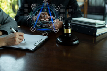 Concepts of Law and Legal services. Lawyer working with law interface icons. Blurred background.	