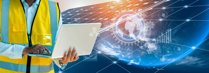 Double exposure of engineering using laptop computer on solar energy production plant, Business technology and Solar energy environment  concept. 