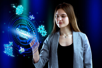 Business, Technology, Internet and network concept. Young businessman working on a virtual screen of the future and sees the inscription: Clinical trial