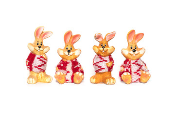Easter porcelain four cute rabbits on white background