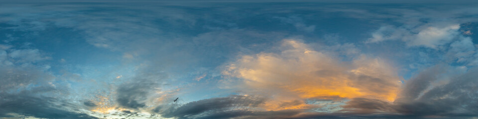 Dark blue sunset sky panorama with golden Cumulus clouds. Seamless hdr 360 panorama in spherical equirectangular format. Full zenith for 3D visualization, sky replacement for aerial drone panoramas.