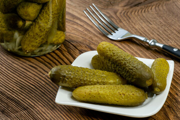 Cucumbers pickled in vinegar on a plate