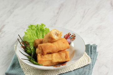Sosis Solo or Fried Egg Crepe with Minced Beef or Chicken Filling.