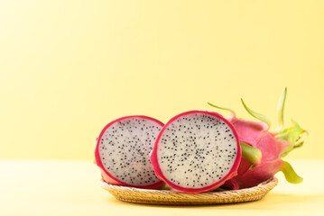Fresh dragon fruit or pitaya on yellow background, Tropical fruit