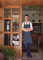 This restaurant feels like home. Shot of a man working at a restaurant.