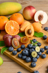 Naklejka na ściany i meble Mango blueberry orange and other fruits