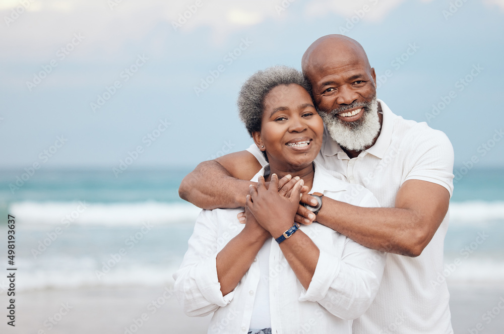 Canvas Prints I am him, he is me. Shot of a mature couple spending time at the beach.