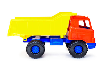 colorful plastic toy tipper dumper truck, isolated (global altered) © S_E