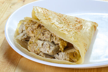 Pancake with chicken and onion
