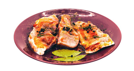pork steaks on ceramic dishware