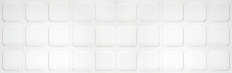 White wide rectangle ceramic tiles texture background.