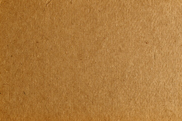 Brown cardboard background, flawed paper texture