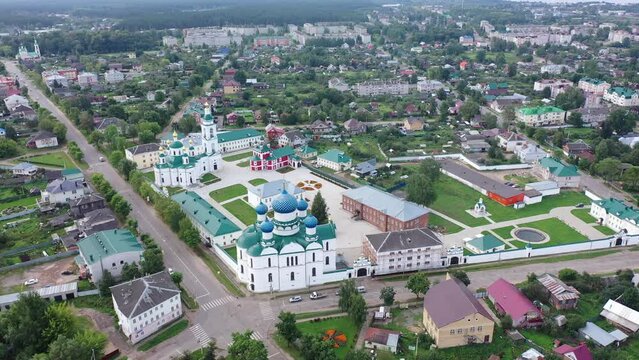 View from drone of architectural complex of Epiphany Monastery, Orthodox convent with cathedrals in center of Russian city of Uglich on summer day, Yaroslavl region . High quality 4k footage