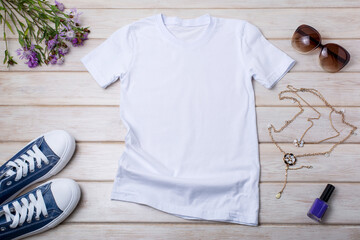 Womens white T-shirt mockup with burdock flowers