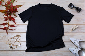 Womens black T-shirt mockup with white heels and grass