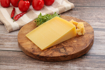 Parmesan hard cheese with small pieces