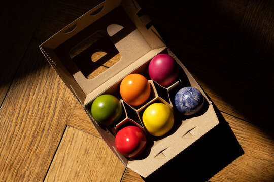 Egg carton with colorful Easter eggs