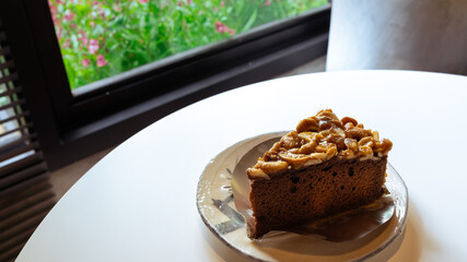 Toffee cake with cashew nut and caramel syrup