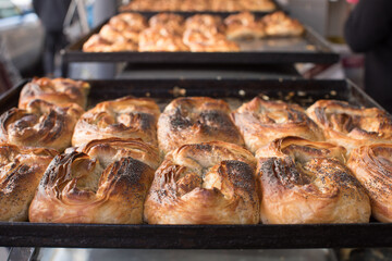 Freshly baked challah on a tray 