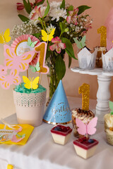 sweet counter with cakes and candies