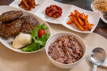 Korean traditional meal with rice and side dishes