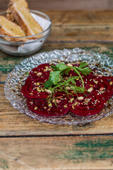 Cooked beetroot topped with seeds 