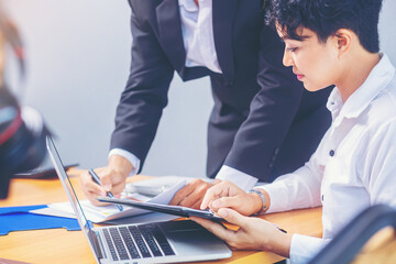 Crop image of business people meeting to discuss the situation on the year plan marketing and business result. Selected focus