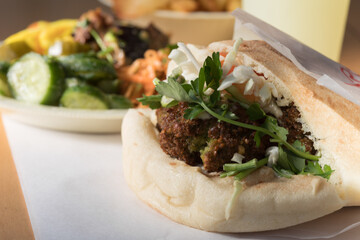 Falafel in pita bread with fries 
