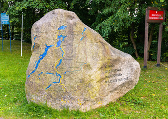 Stone memorial of Droga Kaszubska Landscape Route construction on top of Zlota Gora Golden Mountain in Pomerania of Kashubian region of Poland