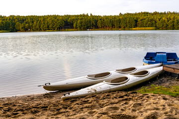 Recreation pontoons on shore of Jezioro Gwiazdy lake in Bukowo Borowy Mlyn Village of Pomerania in Kashubian region of northern Poland - obrazy, fototapety, plakaty