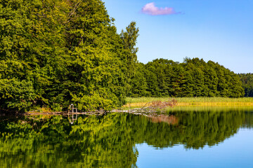 Wooded shore of Jezioro Gwiazdy lake in Bukowo Borowy Mlyn Village near Bytow of Pomerania in Kashubian region of northern Poland © Art Media Factory