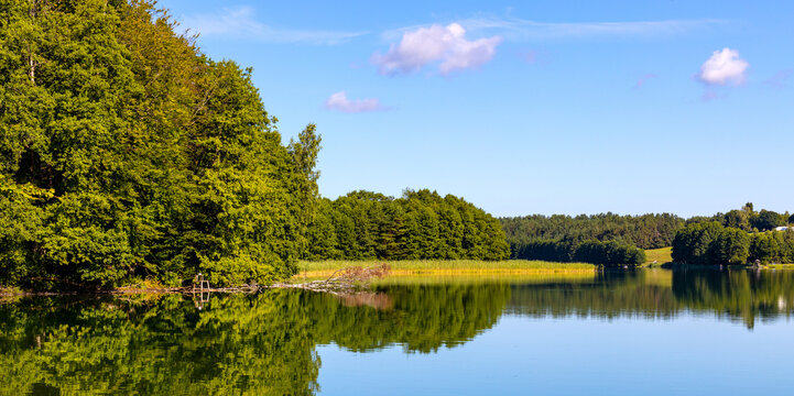 Wooded shore of Jezioro Gwiazdy lake in Bukowo Borowy Mlyn Village near Bytow of Pomerania in Kashubian region of northern Poland