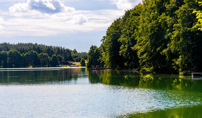 Wooded shore of Jezioro Gwiazdy lake in Bukowo Borowy Mlyn Village near Bytow of Pomerania in Kashubian region of northern Poland © Art Media Factory