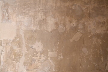 rotbrauner marmorierter  Kalkputz auf Wand 