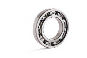 ball bearing on a white background close-up, blur as an artistic device, place for copy space