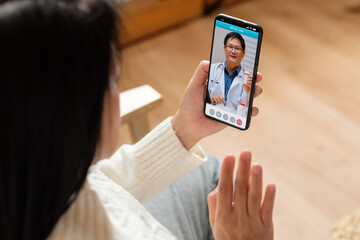 Consulting doctor visit on mobile app at home.telemedicine