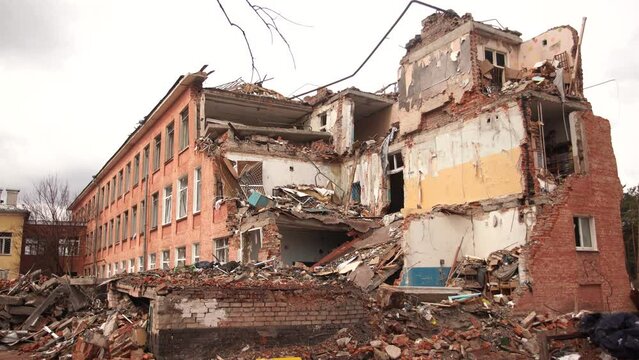 Video footage of damaged school in ukrainian city Chernihiv near Kyiv on north of Ukraine. Ruins during War of Russia against Ukraine. Walls of ruined building by enemy aircraft troops or artilllery