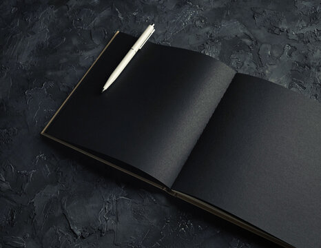 Blank Black Open Brochure Or Notebook And Pen. Responsive Design Mockup.