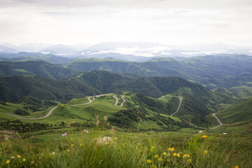 Naklejka na ściany i meble beautiful natural mountain landscape with serpentine road