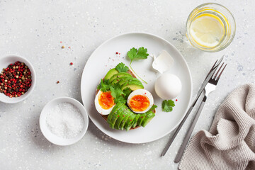 breakfast avocado sandwich with boiled egg