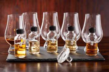tasting bottles and glasses of whisky spirit brandy cognac. tasting at home
