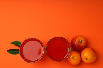 Concept of fresh drink with red orange juice, space for text