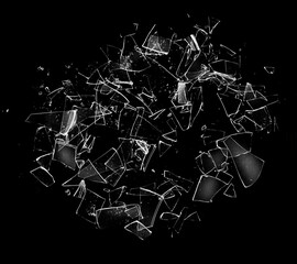Explosion of cracked glass. Overlay the effect of glass damage. Split glass on a black background.