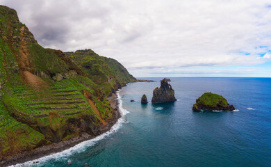 Fototapeta na wymiar Aerial view of Ribeira da Janela volcanic sea stacks in Madeira island, Portugal