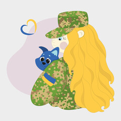 Ukrainian military girl in a pixel uniform with a rescued cat in his arms