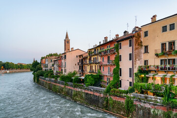 Naklejka premium Facades of old houses on waterfront of the Adige River, Verona