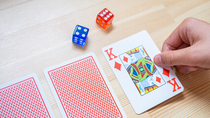 Playing cards and colorful dice_05