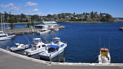Kiama harbour boats docked in New South Wales 