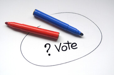 conceptual image the choice between the red and blue parties and which to vote for?
