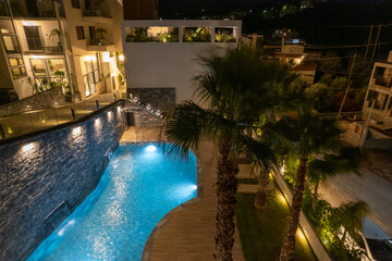 Above view of a hotel swimming pool in the night